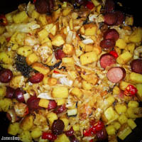 Beef sausage baked with potato, carrot, Italian peppers, dried carrot top, and homemade sauerkraut